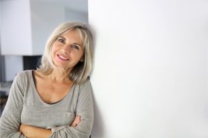 The woman is taking a break before facing her problem.